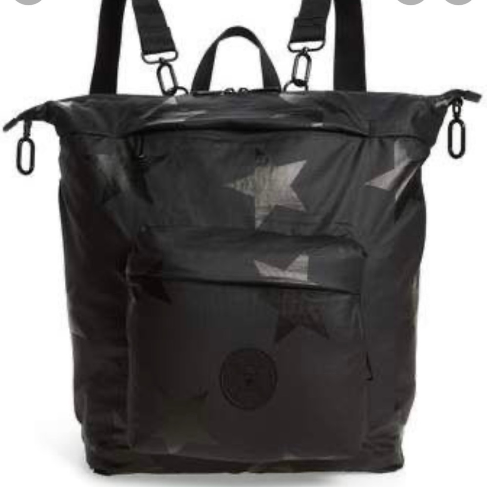 Nununu Diaper bag with black stars.